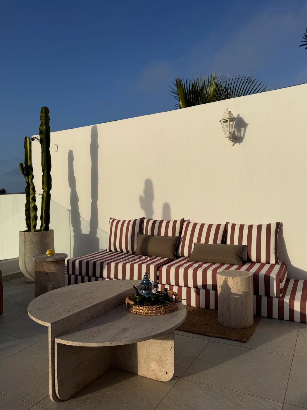Striped terrace sofa at Maison Simonetta, Oualidia